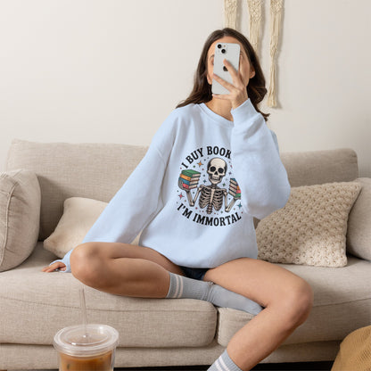 Book Lover Sweatshirt — "I Buy Books Like I’m Immortal" Skeleton Reading Crewneck - Back has Northkind's blueprint for bookish heaven