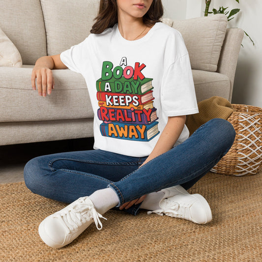 'A Book a Day Keeps Reality Away' T-Shirt — Stack of Books Graphic