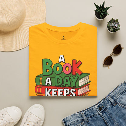 'A Book a Day Keeps Reality Away' T-Shirt — Stack of Books Graphic