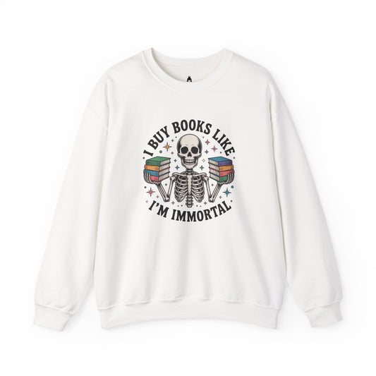 Book Lover Sweatshirt — "I Buy Books Like I’m Immortal" Skeleton Reading Crewneck - Back has Northkind's blueprint for bookish heaven