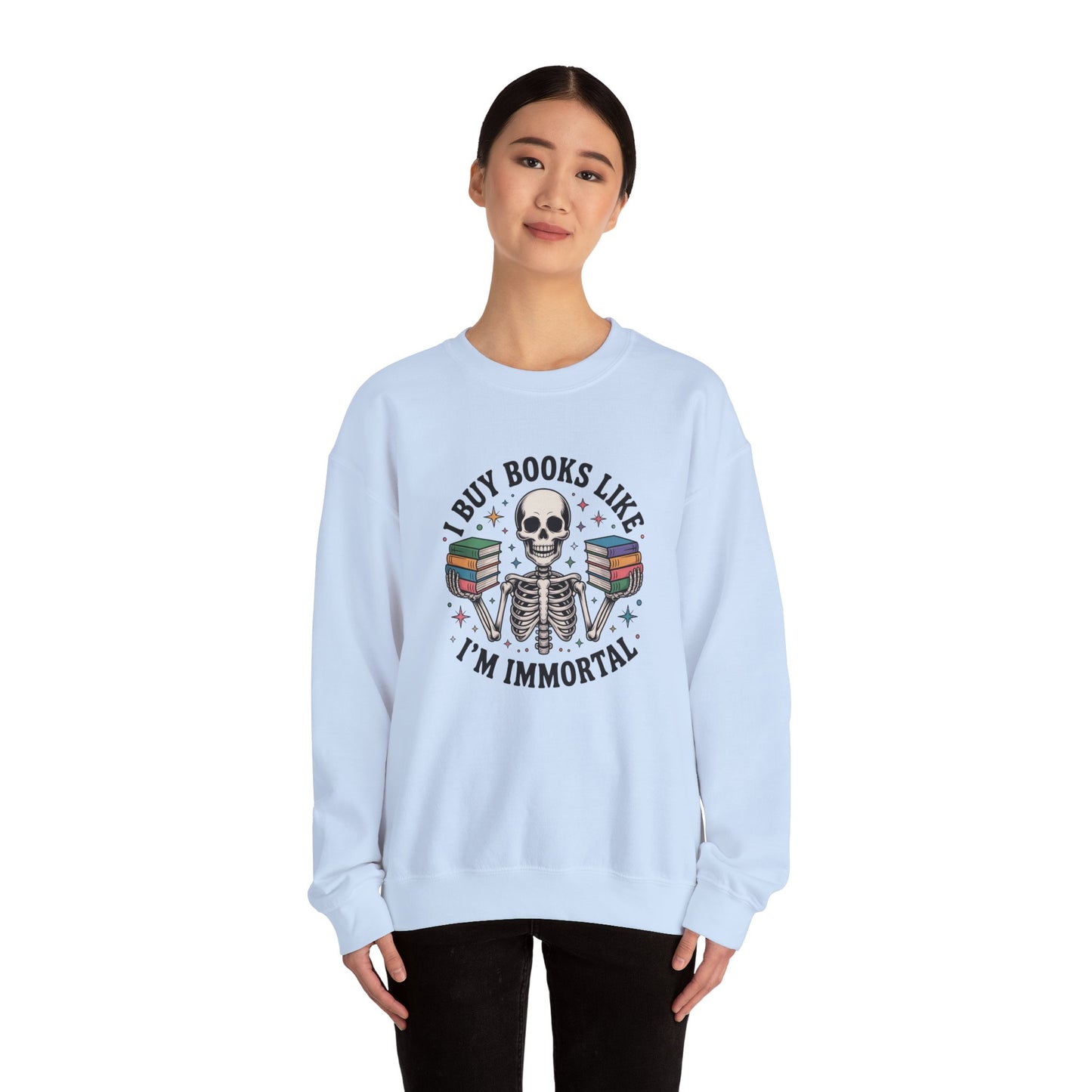 Book Lover Sweatshirt — "I Buy Books Like I’m Immortal" Skeleton Reading Crewneck - Back has Northkind's blueprint for bookish heaven