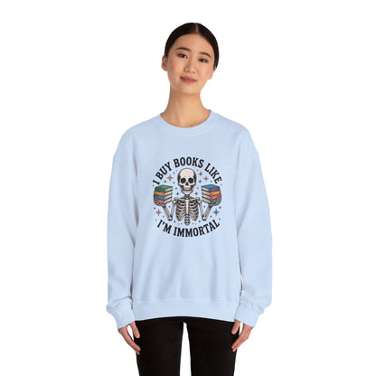Book Lover Sweatshirt — "I Buy Books Like I’m Immortal" Skeleton Reading Crewneck - Back has Northkind's blueprint for bookish heaven