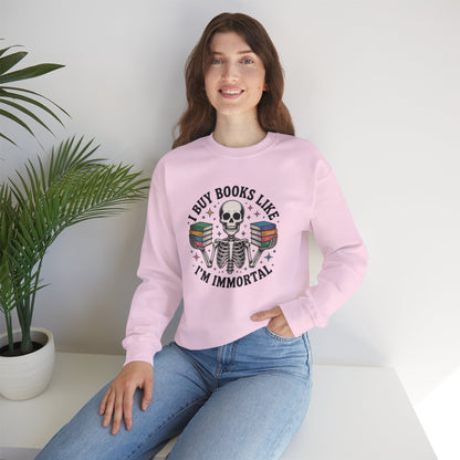 Book Lover Sweatshirt — "I Buy Books Like I’m Immortal" Skeleton Reading Crewneck - Back has Northkind's blueprint for bookish heaven