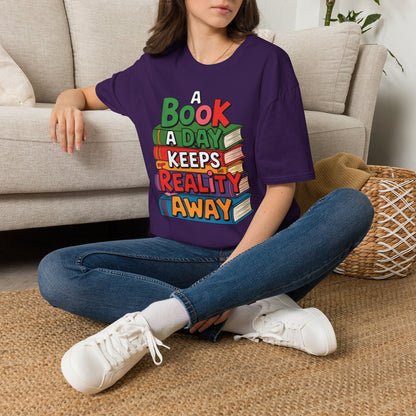 'A Book a Day Keeps Reality Away' T-Shirt — Stack of Books Graphic