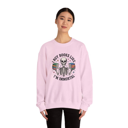 Book Lover Sweatshirt — "I Buy Books Like I’m Immortal" Skeleton Reading Crewneck - Back has Northkind's blueprint for bookish heaven